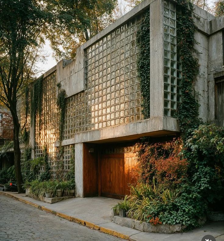 Concrete home bathed in golden sunset light